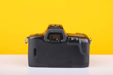 Load image into Gallery viewer, Minolta Dynax 303si with Minolta AF Zoom 28-100mm f3.5 - 5.6 D Lens
