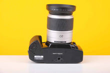 Load image into Gallery viewer, Minolta Dynax 303si with Minolta AF Zoom 28-100mm f3.5 - 5.6 D Lens
