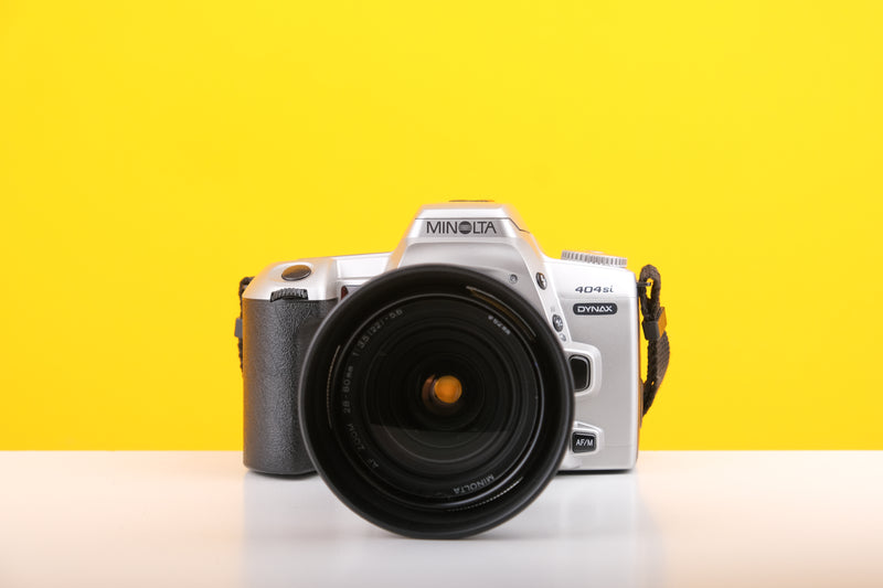 Minolta Dynax 404si 35mm Film Camera with Minolta 28-80mm f3.5-5.6 AF Zoom Lens Boxed