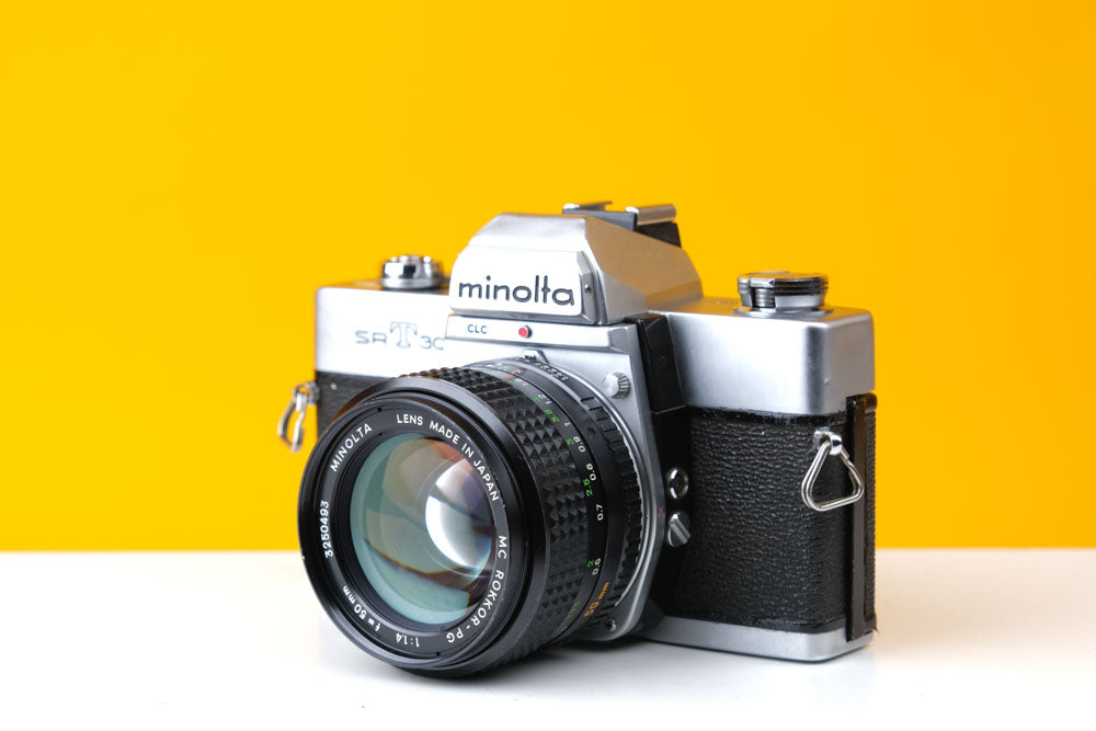 Minolta SrT303 35mm SLR Film Camera with Minolta 50mm f1.4 Lens