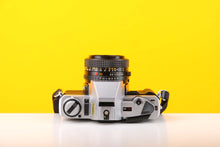 Load image into Gallery viewer, Minolta X-300 35mm Film Camera with Minolta MD 50mm f1.7 Lens
