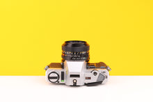Load image into Gallery viewer, Minolta X-300 35mm Film Camera with Minolta MD 50mm f2 Lens
