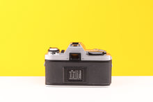 Load image into Gallery viewer, Minolta X-300 35mm Film Camera with Minolta MD 50mm f2 Lens
