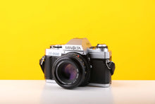 Load image into Gallery viewer, Minolta X-300 35mm Film Camera with Minolta MD 50mm f1.7 Lens
