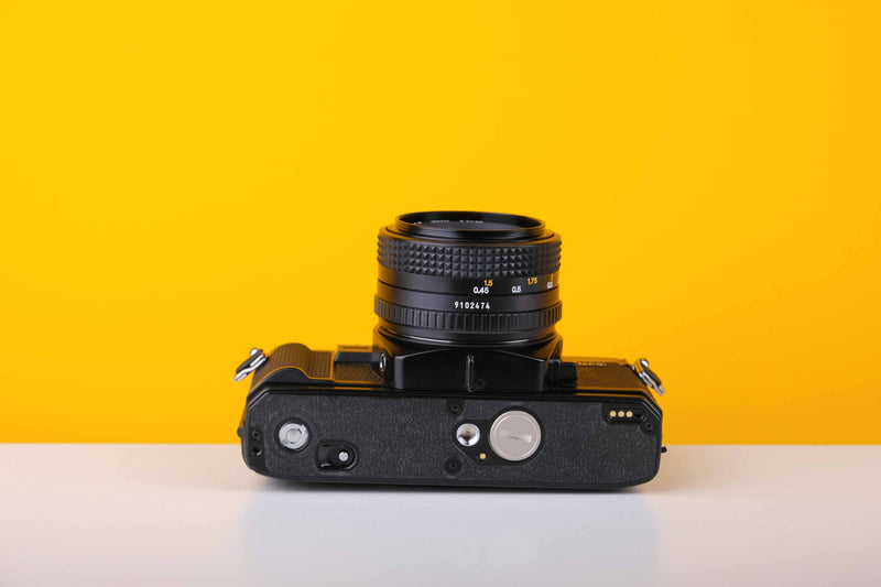 Minolta X-700 35mm SLR Film Camera with Minolta MD 50mm f1.7 Lens