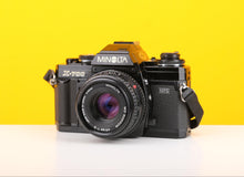 Load image into Gallery viewer, Minolta X-700 35mm Film SLR Camera with Minolta MD Rokkor 45mm f/2 Lens
