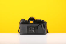 Load image into Gallery viewer, Minolta X-700 35mm Film SLR Camera with Minolta MD Rokkor 45mm f/2 Lens
