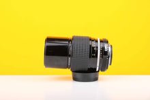 Load image into Gallery viewer, Nikon Nikkor 200mm f4 Telephoto Lens AI Mount
