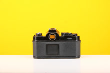 Load image into Gallery viewer, Nikon FM 35mm Film Camera with Nikon Nikkor 28mm f/2.8 Lens
