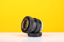 Load image into Gallery viewer, Olympus Auto-Zoom 28-48mm f/4 OM Mount Lens
