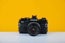 Load image into Gallery viewer, Olympus OM-2 Spot program 35mm Film Camera with Olympus 28mm f3.5 Prime Lens
