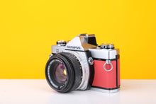 Load image into Gallery viewer, Olympus OM-1 MD 35mm Film Camera with Zuiko 50mm f/1.8 Prime Lens

