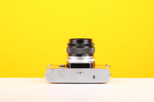 Load image into Gallery viewer, Olympus OM-2 35mm SLR Film Camera with Zuiko Olymplus OM-System G.Zuiko Auto-S 50mm f1.4 Lens in Yellow
