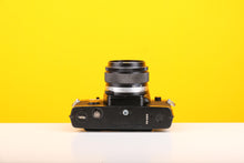 Load image into Gallery viewer, Olympus OM-4 35mm SLR Film Camera with Olympus Om-system G.Zuiko Auto-s 50mm f/1.4 Lens
