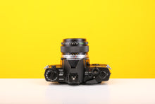 Load image into Gallery viewer, Olympus OM-4 35mm SLR Film Camera with Olympus Om-system G.Zuiko Auto-s 50mm f/1.4 Lens
