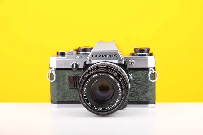 Olympus OM10 35mm Film Camera with Zukio Olympus OM-System MC Auto-S 50mm f1.8 Auto-Zoom Lens in Green