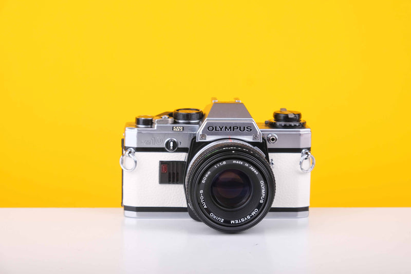 Olympus OM10 35mm Film Camera with Olympus OM-System Zukio Auto-S 50mm f1.8 Lens in New White Leather Skin