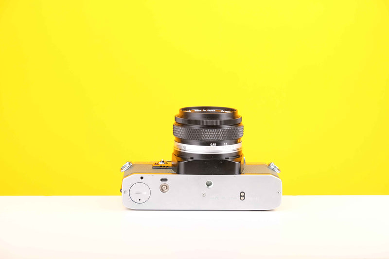 Olympus OM10 35mm Film Camera with Olympus Zuiko Auto-S 50mm f1.8 Lens in Safari Green