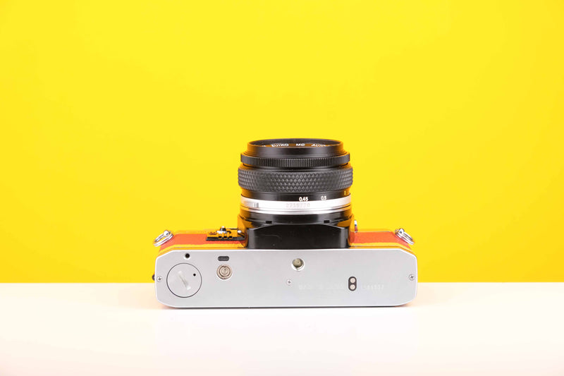 Olympus OM10 Slr Vintage 35mm Film Camera with Zuiko 50mm f1.8 Prime Lens with New Leather Red and Yellow Skin