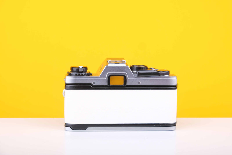Olympus OM10 35mm Film Camera with Olympus OM-System Zukio Auto-S 50mm f1.8 Lens in New White Leather Skin