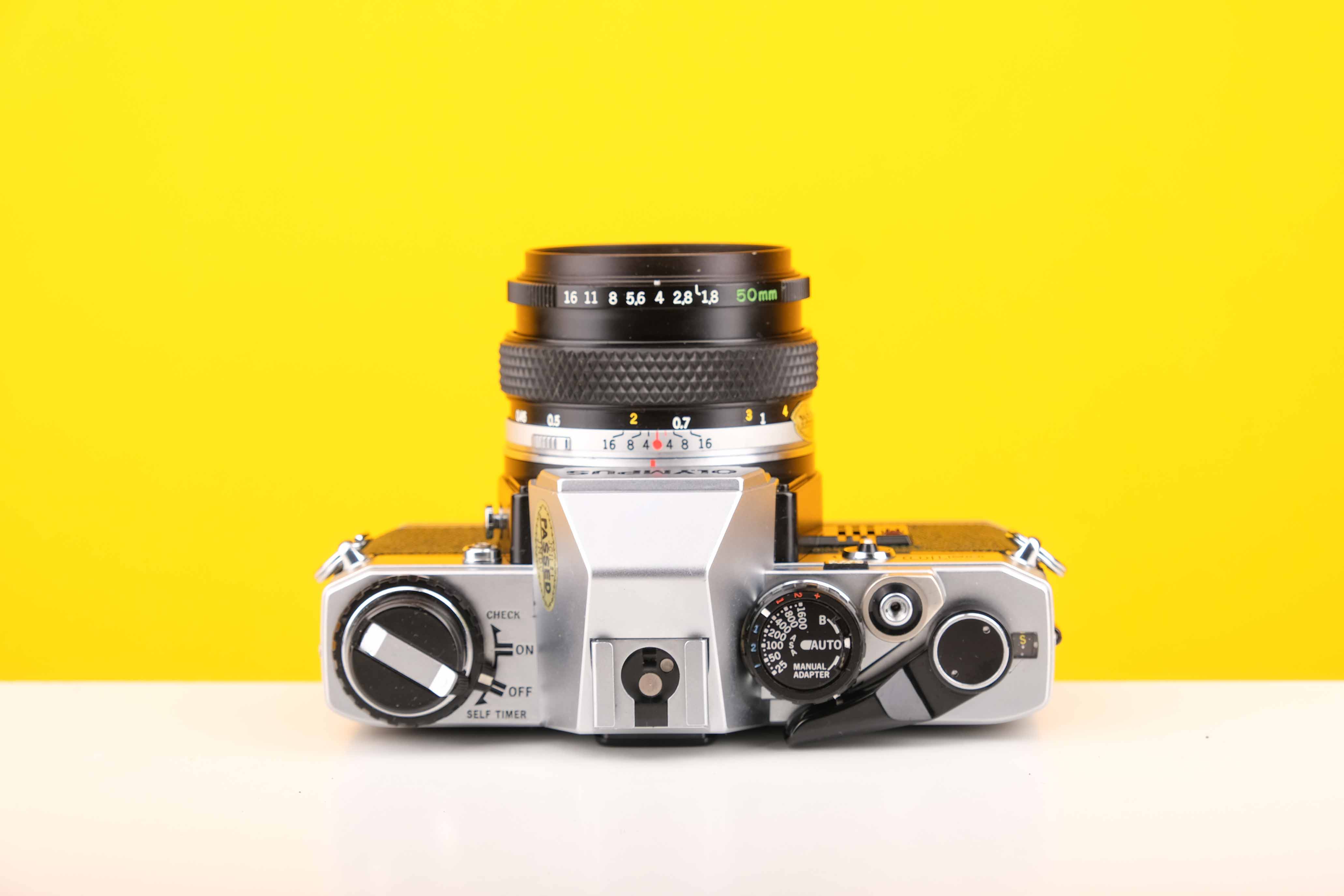 Olympus OM10 35mm Film Camera with Zukio Olympus OM-System MC Auto