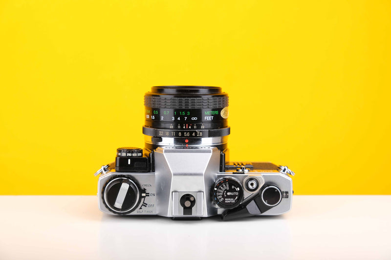 Olympus OM10 35mm Film Camera with Vivitar 28mm f2.8 MC Lens with Manual Adapter