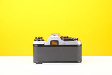 Load image into Gallery viewer, Olympus OM10 35mm SLR Film Camera with Miranda 28-70mm f3.8-4.8 MC Macro Lens
