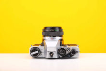 Load image into Gallery viewer, Olympus OM10 SLR 35mm Film Camera with Olympus Auto-S 50mm f/1.8 MC Lens
