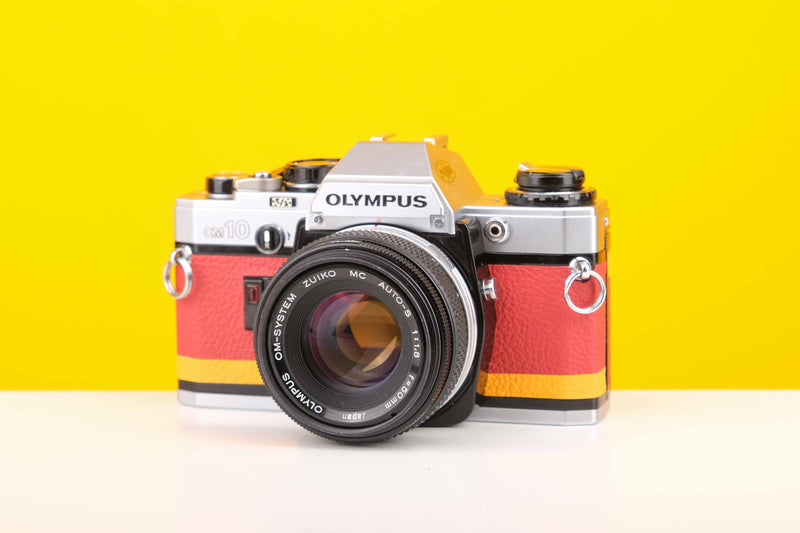 Olympus OM10 Slr Vintage 35mm Film Camera with Zuiko 50mm f1.8 Prime Lens with New Leather Red and Yellow Skin