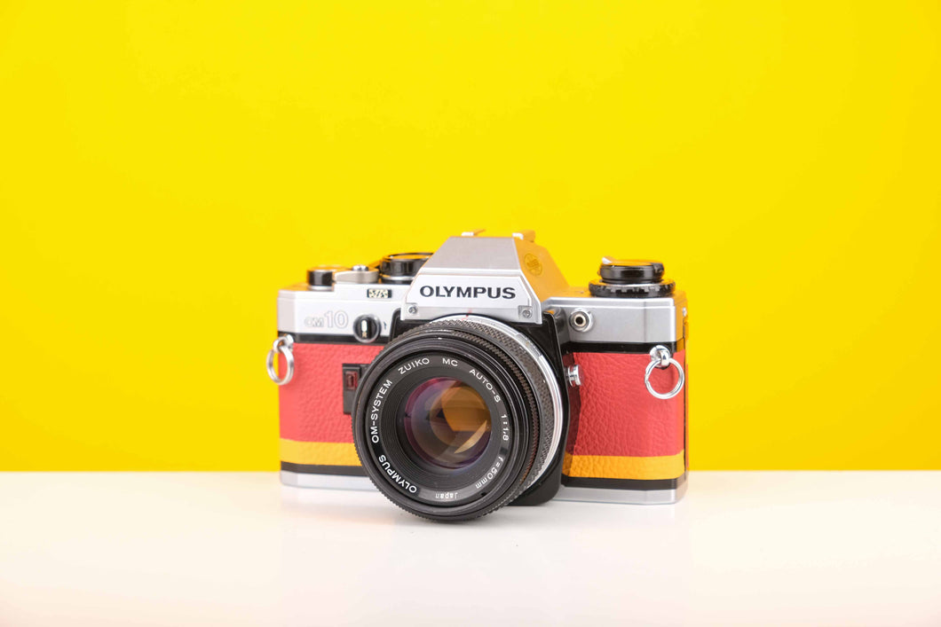 Olympus OM10 Slr Vintage 35mm Film Camera with Zuiko 50mm f1.8 Prime Lens with New Leather Red and Yellow Skin