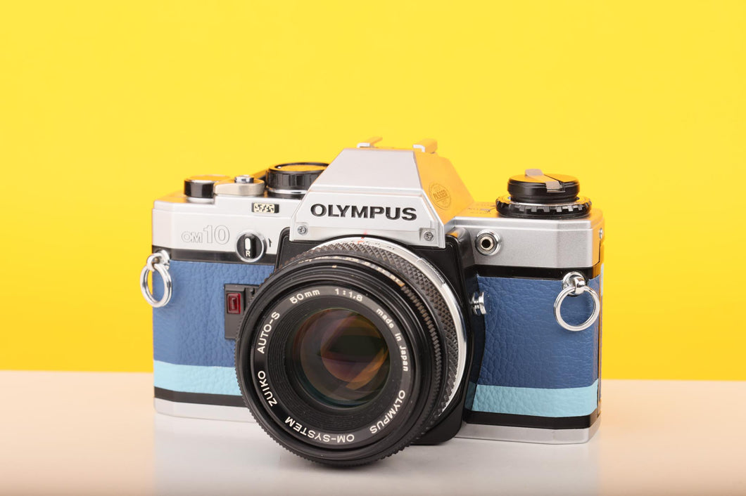 Olympus OM10 SLR Vintage 35mm Film Camera with Zuiko 50mm f/1.8 Prime Lens Reconditioned With New Blue Leather Skin