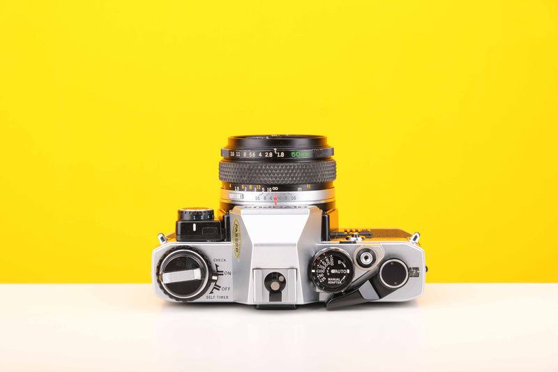 Olympus OM10 SLR 35mm Film Camera with Olympus Auto-S 50mm f1.8 MC Lens and Manual Adapter