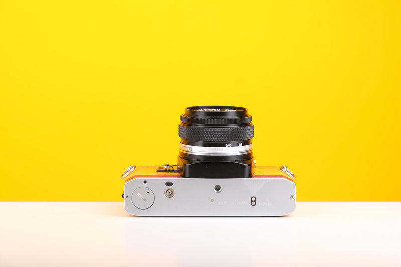 Olympus OM10 Slr Vintage 35mm Film Camera with Zuiko 50mm f1.8 Prime Lens and with New Leather Yellow and Red Skin