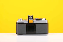 Load image into Gallery viewer, Olympus OM-1n 35mm SLR Film Camera with Olympus OM-System G.Zuiko Auto-S 50mm f1.4 Lens
