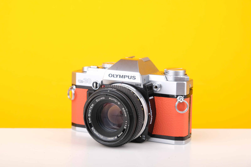 Olympus OM30 35mm Film Camera with Olympus Zuiko Auto-S 50mm f1.8 Lens in Orange