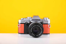 Load image into Gallery viewer, Olympus OM30 35mm Film Camera with Olympus Zuiko Auto-S 50mm f1.8 Lens in Orange
