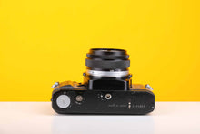 Load image into Gallery viewer, Olympus OM40 Program 35mm Film Camera with Olympus OM-System F.Zuiko Auto-S 50mm f1.8 Lens
