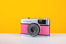 Load image into Gallery viewer, Olympus Trip 35 Vintage 35mm Film Camera with Zuiko 40mm f2.8 Lens with Customised Pink Skin
