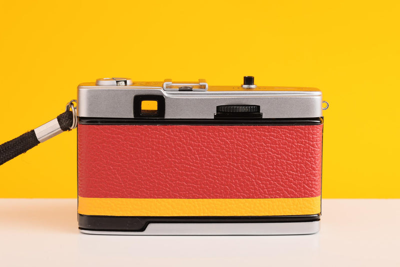 Olympus Trip 35 Vintage 35mm Film Camera in Red and Yellow Leather Skin