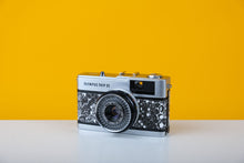 Load image into Gallery viewer, Olympus Trip 35 35mm Film Camera with New Faux Snake Design Leather Skin
