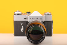Load image into Gallery viewer, Zenit B 35mm SLR Film Camera with Hoya 135mm f/2.8
