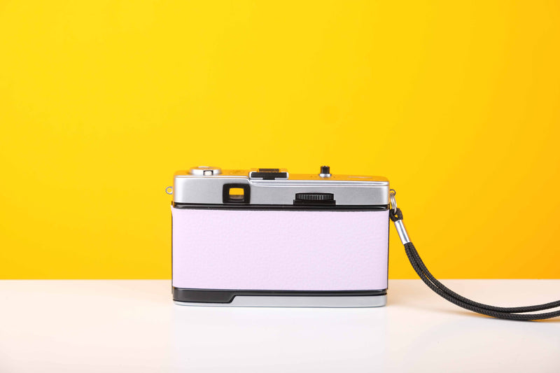 Olympus Trip 35 Vintage 35mm Film Camera with Zuiko 40mm f2.8 Lens and New Lilac Leather Skin