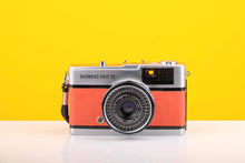 Load image into Gallery viewer, Olympus Trip 35 Vintage 35mm Film Camera with Zuiko 40mm f2.8 Lens and New Orange Leather Skin
