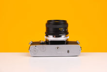 Load image into Gallery viewer, Olympus OM-1 35mm Film Camera with Miranda 24mm f/2.8 Macro Lens
