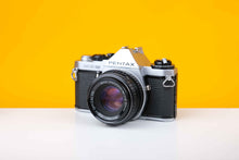 Load image into Gallery viewer, Pentax ME Super 35mm Film Camera with SMC Pentax-M 50mm f/2 Lens
