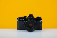 Load image into Gallery viewer, Pentax Mv1 35mm SLR Film Camera with Petri 50mm f/2.0 Lens
