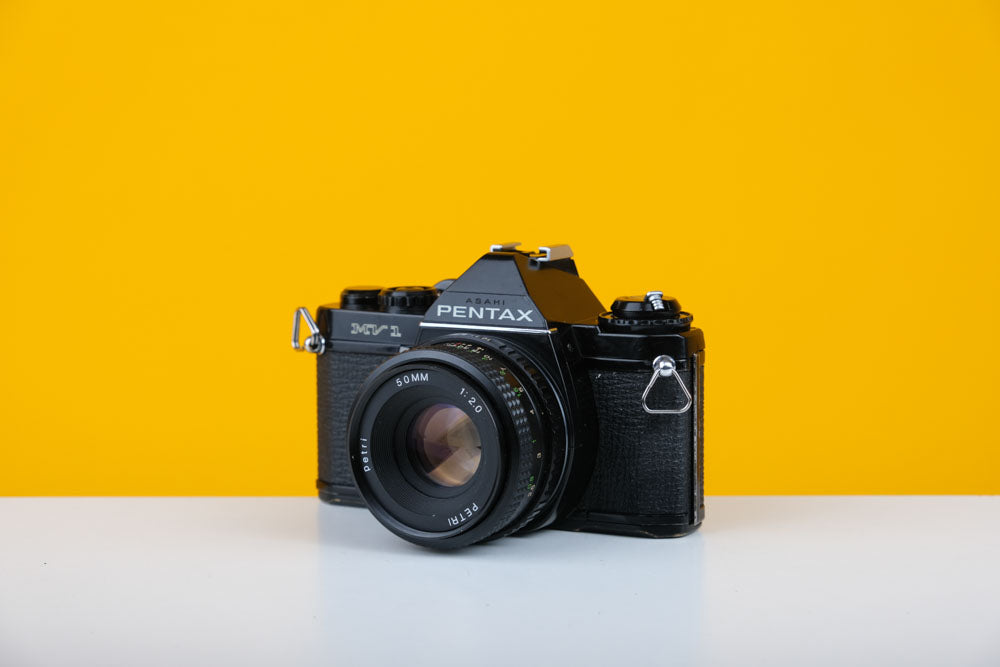 Pentax Mv1 35mm SLR Film Camera with Petri 50mm f/2.0 Lens