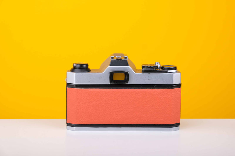 Pentax K1000 35mm Film Camera with SMC Pentax M 50mm f/2 Prime Lens in Orange