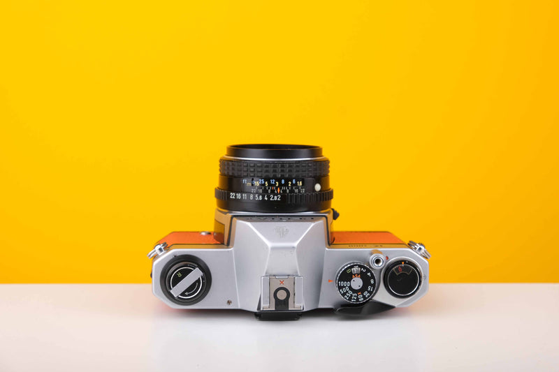 Pentax K1000 35mm Film Camera with SMC Pentax M 50mm f/2 Prime Lens in Orange