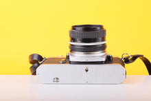Load image into Gallery viewer, Nikkormat EL 35mm SLR Film Camera with Nikon Nikkor 50mm f/1.8 Lens
